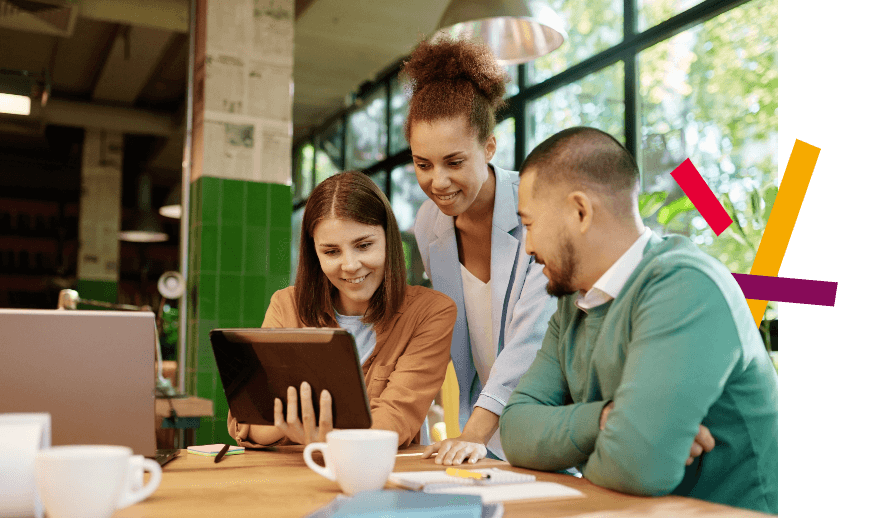 People looking at tablet presentation 