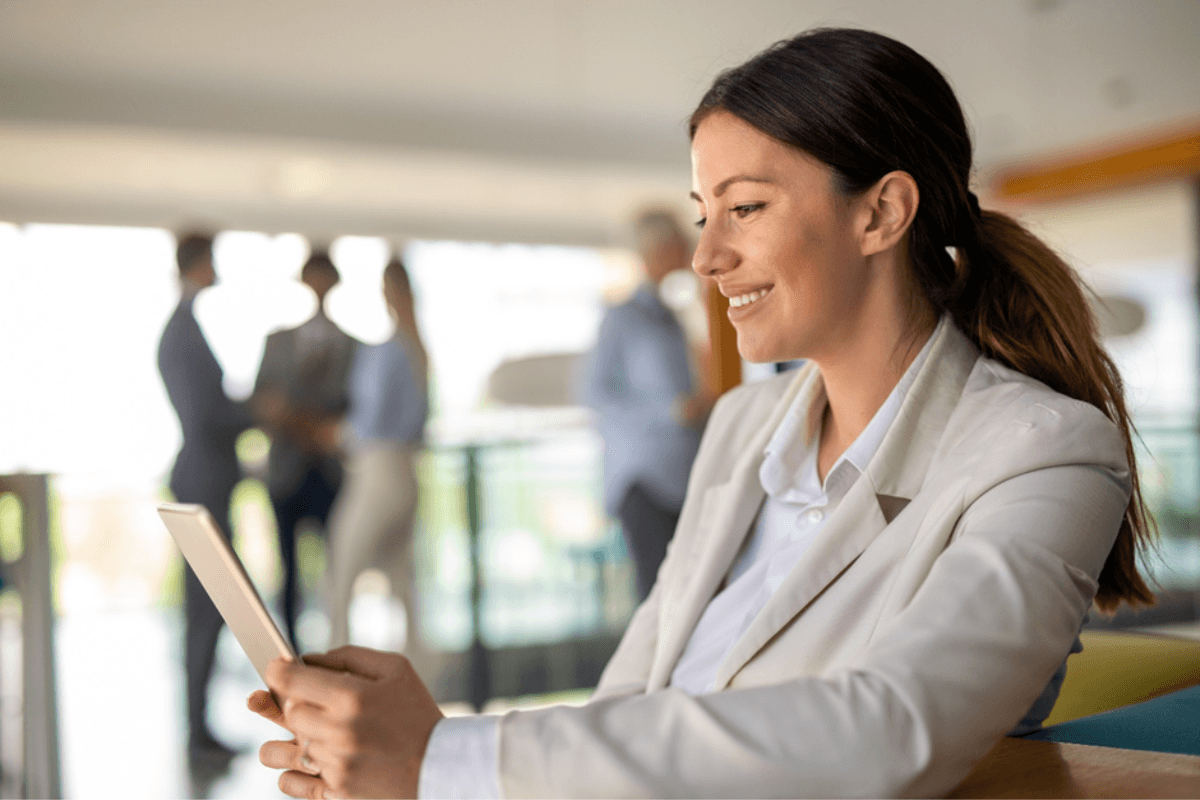 happy woman on tablet