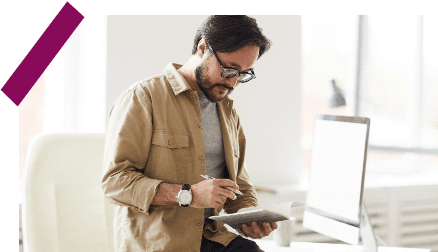 Man looking at tablet